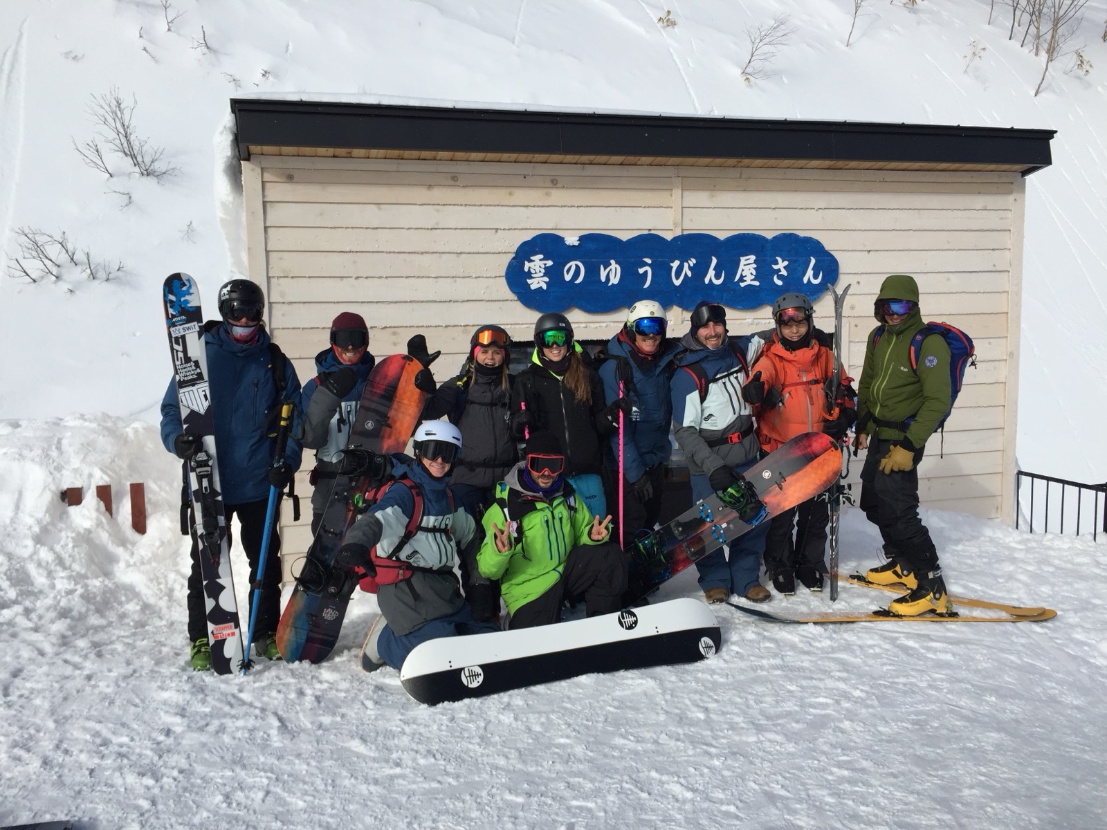 Snowboard crew in deep powder, Japan
